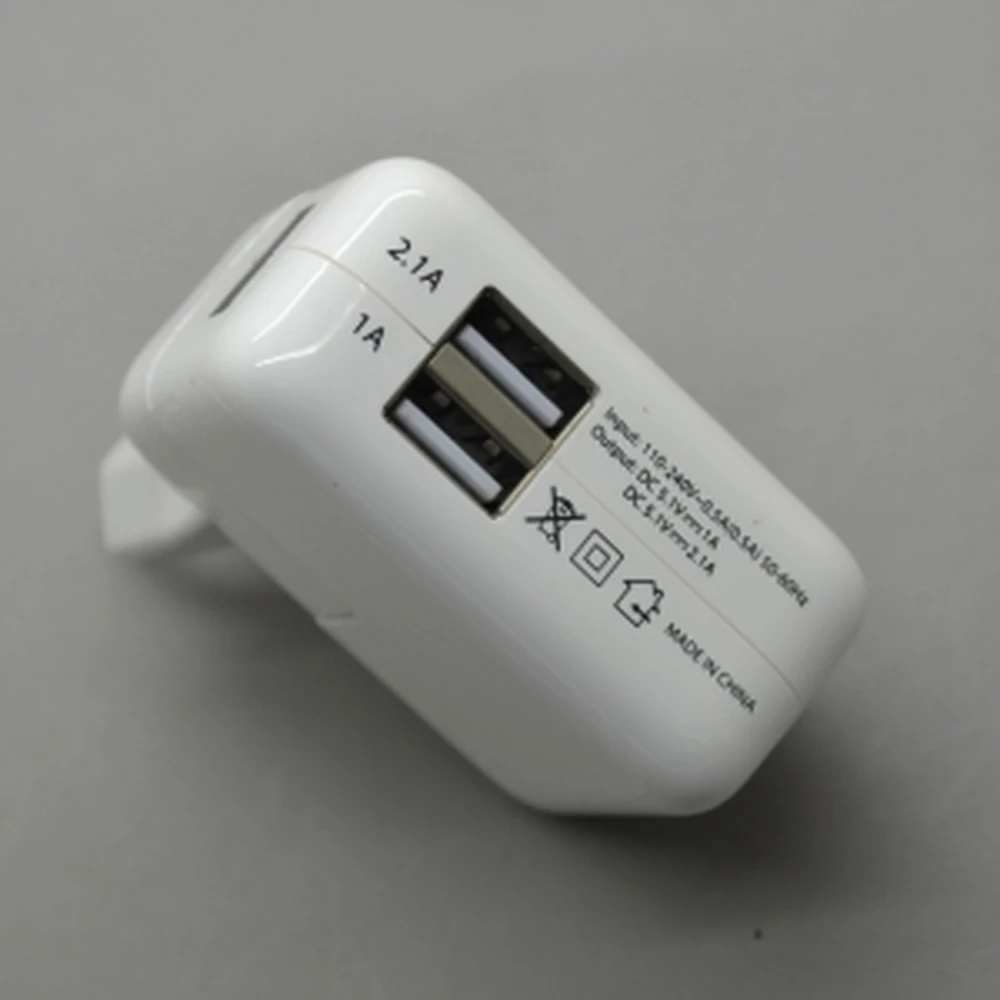 Kahe USB-pordiga seinalaadija 2,1A ja 1A tahvlitele ja telefonidele
